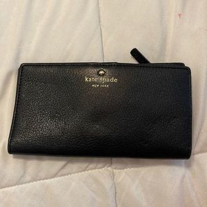 Kate spade wallet.  Small and compact.